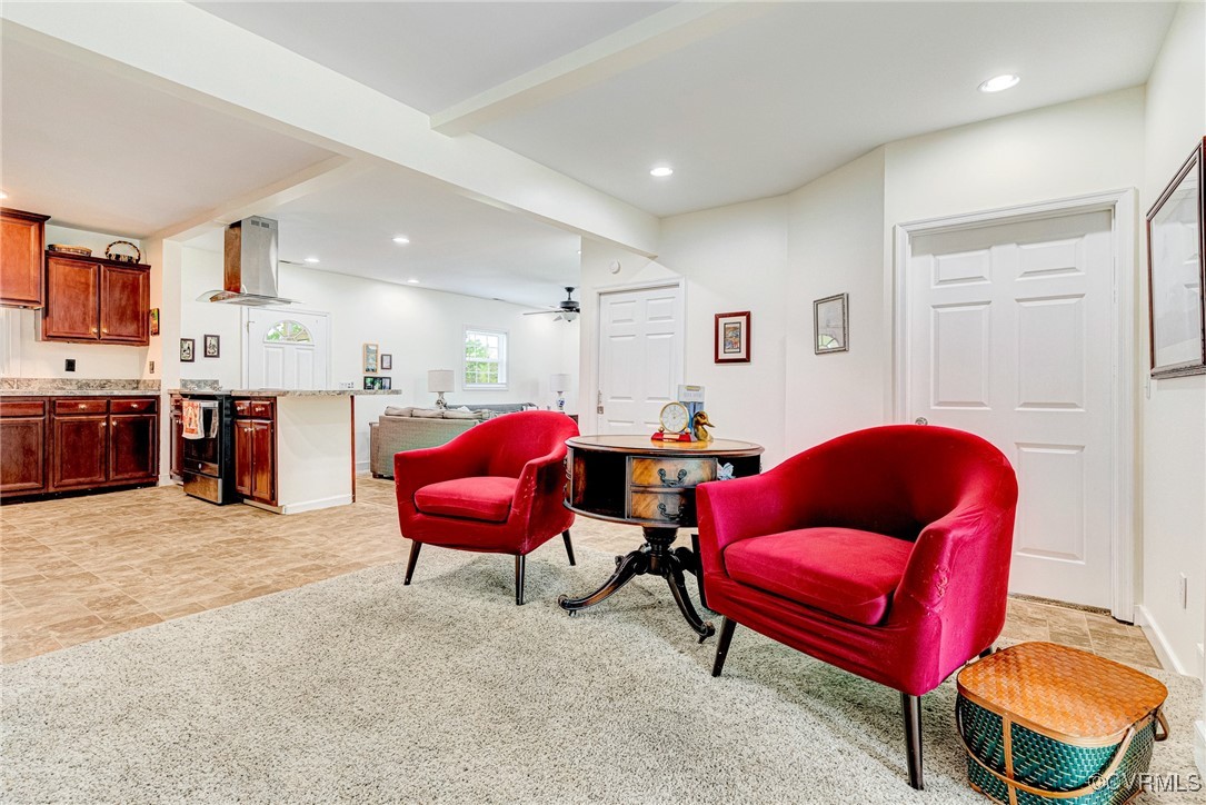 654 Bybee Road Louisa, VA 23093 - Photo 4 of 50 a living room with furniture a rug and kitchen view