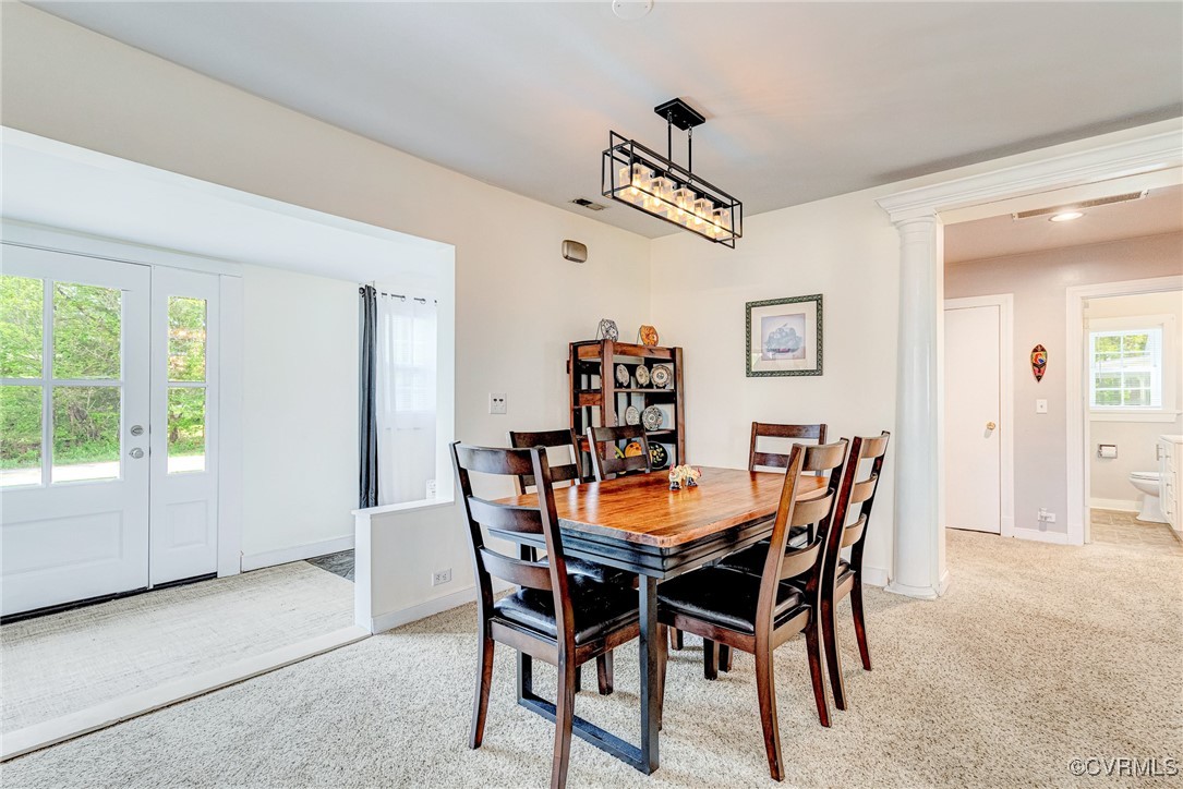 654 Bybee Road Louisa, VA 23093 - Photo 5 of 50 a view of a dining room with furniture and a chandelier