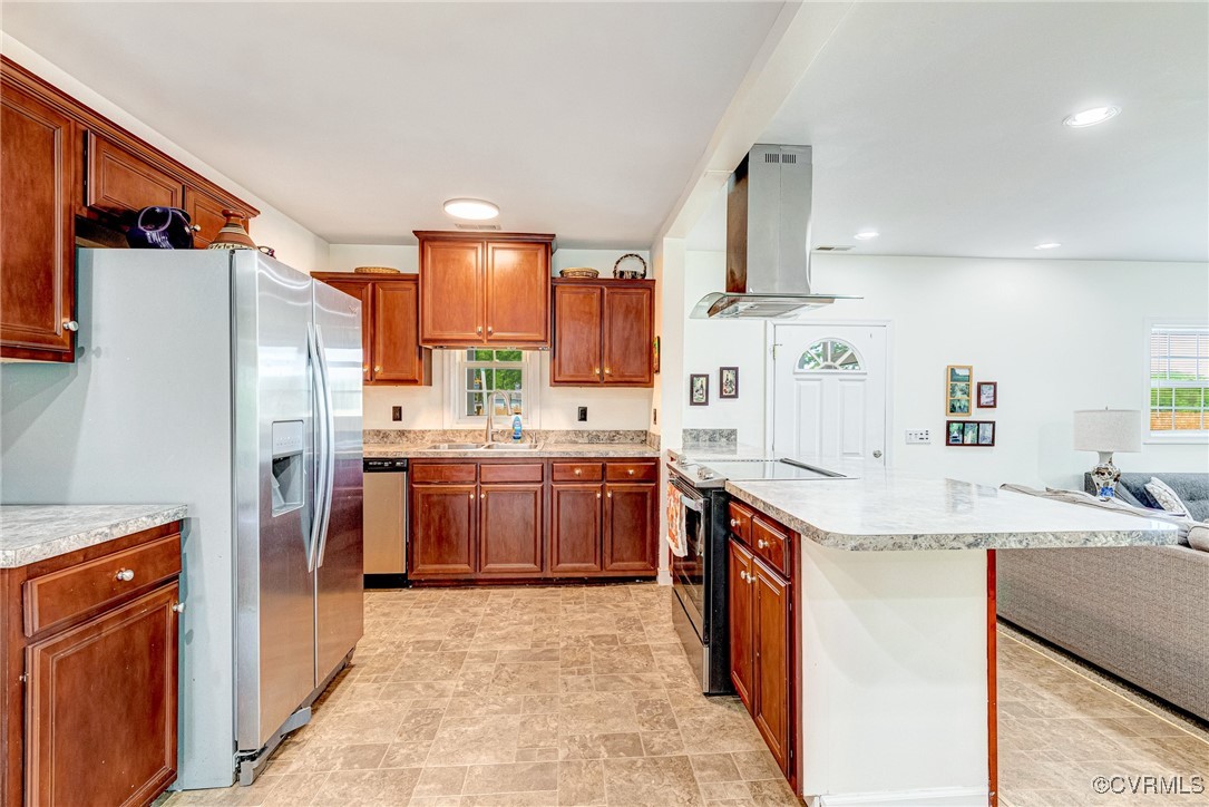654 Bybee Road Louisa, VA 23093 - Photo 7 of 50 a kitchen with a sink refrigerator and a refrigerator