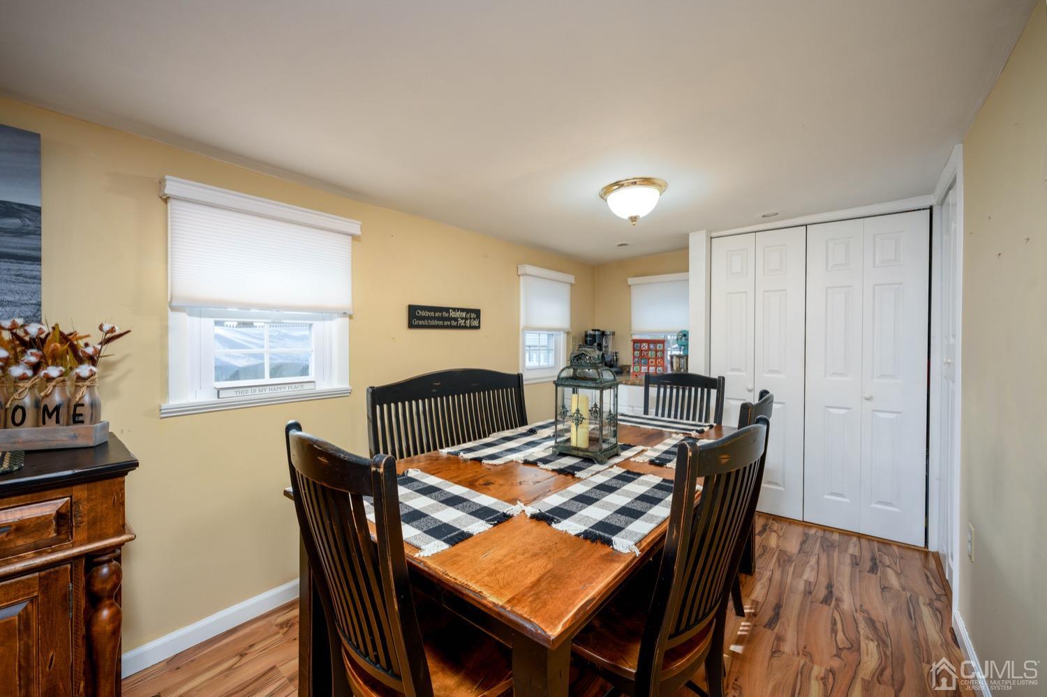 85 Idlewild Road Edison, NJ 08817 - Photo 13 of 28 a view of a dining room with furniture and wooden floor