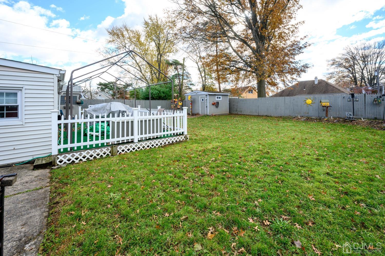 85 Idlewild Road Edison, NJ 08817 - Photo 24 of 28 a view of a house with backyard and deck