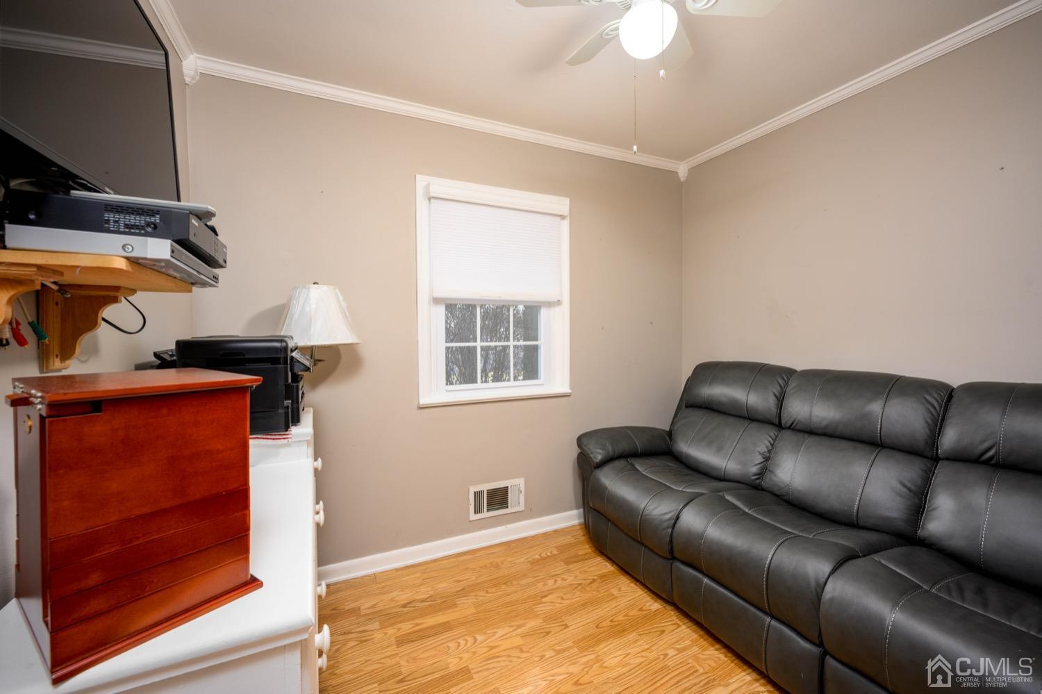 85 Idlewild Road Edison, NJ 08817 - Photo 8 of 28 a living room with furniture