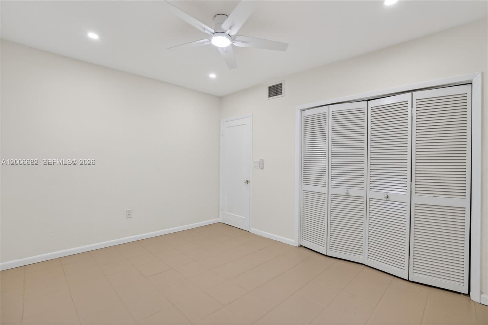 1435 Blue Road Coral Gables, FL 33146 - Photo 22 of 31 an empty room with closet