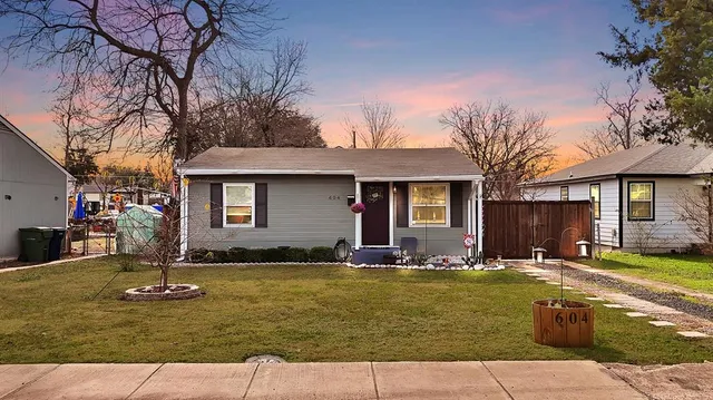 a front view of a house with swimming pool