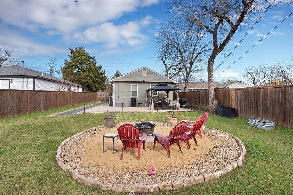 604 Moore Street Garland, TX 75040 - Photo 20 of 26 a view of a house with backyard