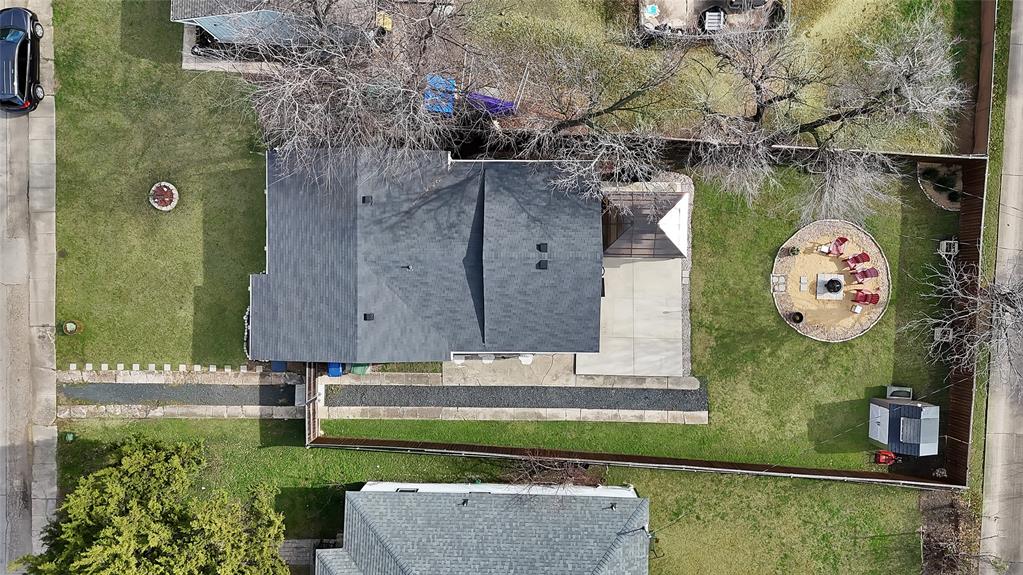 604 Moore Street Garland, TX 75040 - Photo 2 of 26 a front view of a house with garden