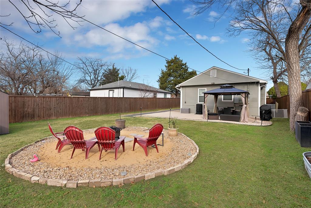 604 Moore Street Garland, TX 75040 - Photo 21 of 26 a view of outdoor space yard and patio