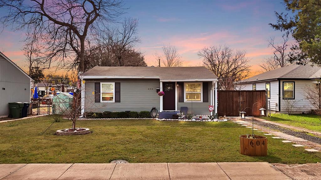 604 Moore Street Garland, TX 75040 - Photo 26 of 26 a front view of a house with swimming pool