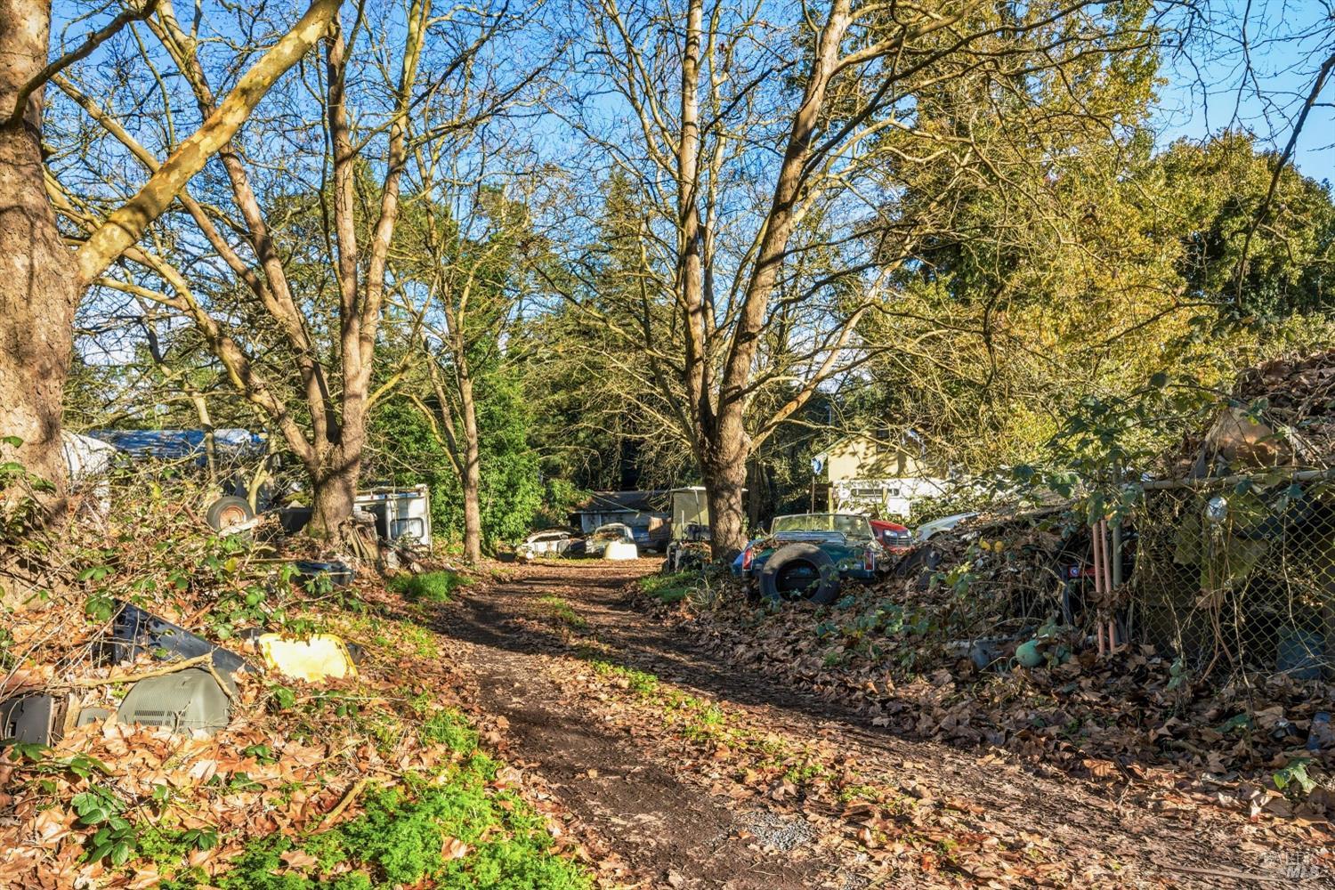 5070 Blank Road Sebastopol, CA 95472 - Photo 26 of 36 a backyard of a house with fountain table and chairs