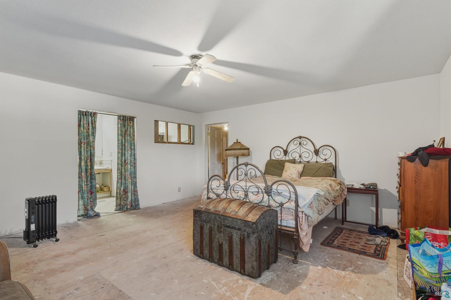 5070 Blank Road Sebastopol, CA 95472 - Photo 33 of 36 a bedroom with furniture and a window