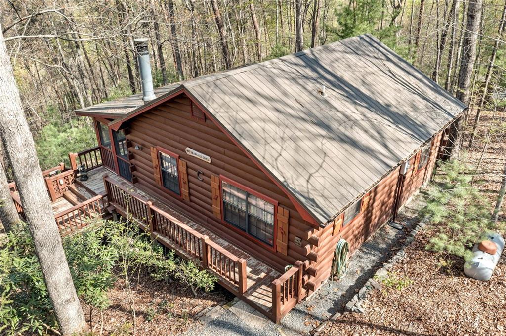 301 Laurel Creek Road Blue Ridge, GA 30513 - Photo 26 of 36 a view of a house with a yard