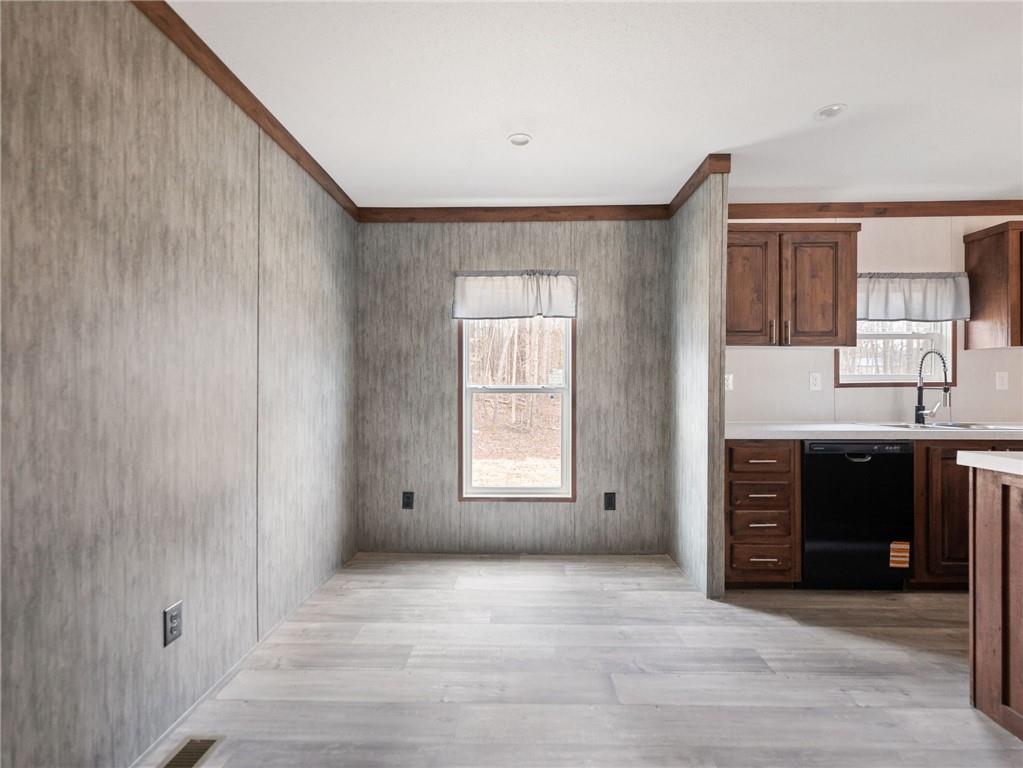 5224 Bogus Road Gainesville, GA 30506 - Photo 20 of 43 a view of an empty room with a fireplace and a window