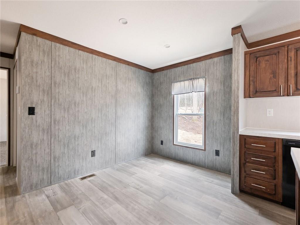 5224 Bogus Road Gainesville, GA 30506 - Photo 21 of 43 a view of an empty room with a window and a kitchen