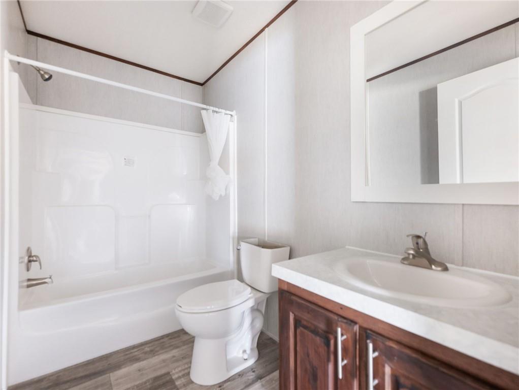 5224 Bogus Road Gainesville, GA 30506 - Photo 30 of 43 a bathroom with a sink toilet and shower