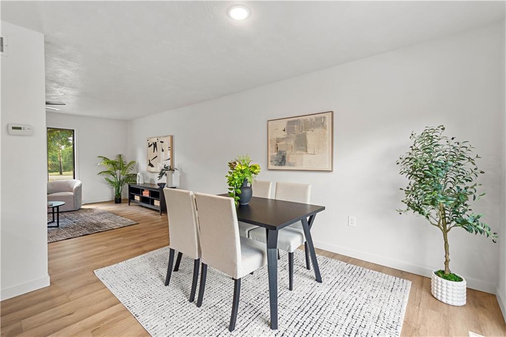 1546 West Ingomar Road Pittsburgh, PA 15237 - Photo 12 of 49 a view of a livingroom with furniture and a potted plant