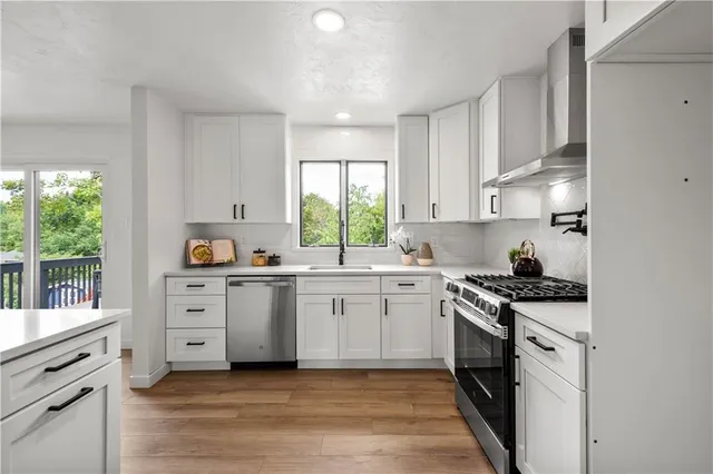 a kitchen with a sink and window