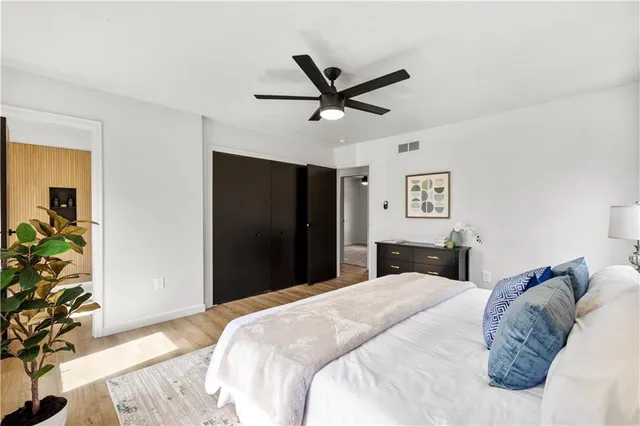 a bathroom with a tub and shower