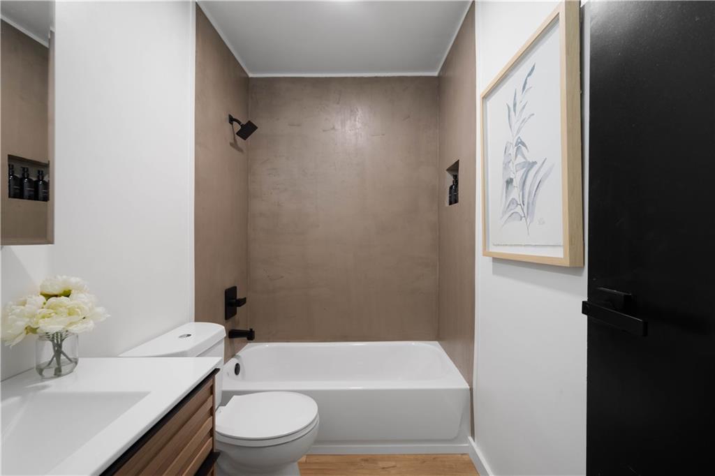 1546 West Ingomar Road Pittsburgh, PA 15237 - Photo 31 of 49 a bathroom with a sink toilet and shower