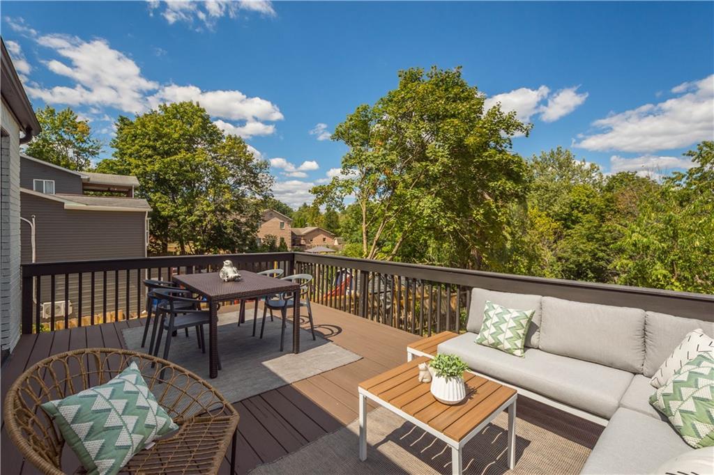 1546 West Ingomar Road Pittsburgh, PA 15237 - Photo 40 of 49 a balcony with wooden floor and outdoor seating