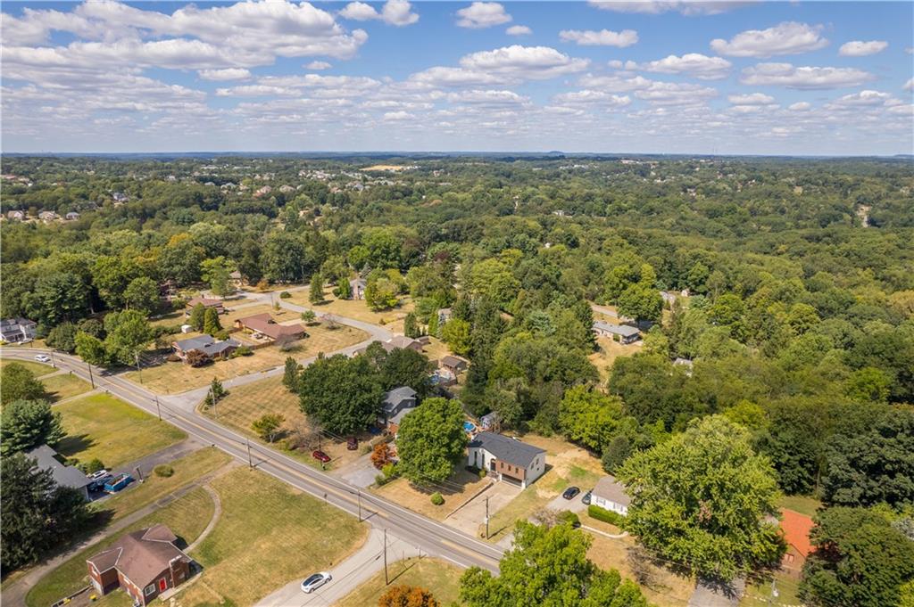 1546 West Ingomar Road Pittsburgh, PA 15237 - Photo 46 of 49 an aerial view of residential houses with outdoor space and trees