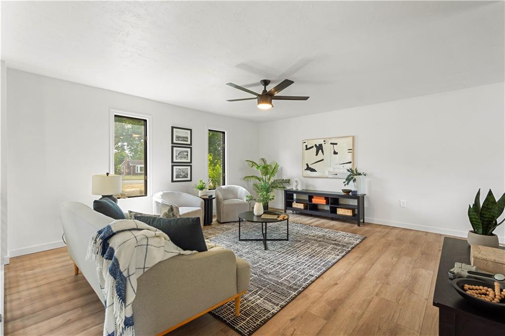 1546 West Ingomar Road Pittsburgh, PA 15237 - Photo 5 of 49 a living room with furniture and wooden floor