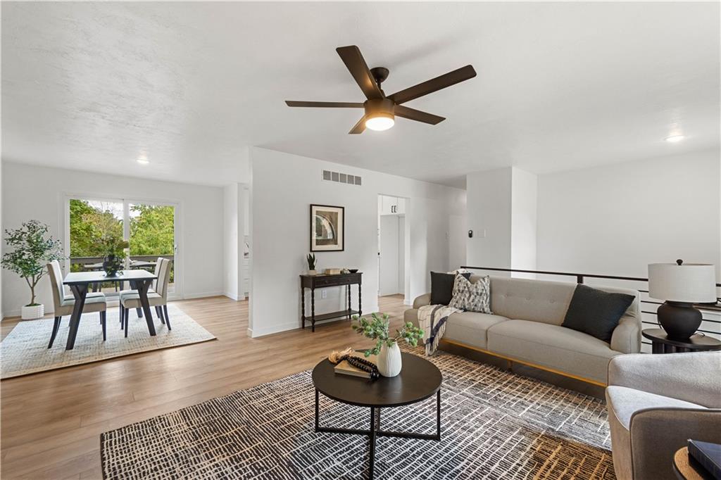 1546 West Ingomar Road Pittsburgh, PA 15237 - Photo 7 of 49 a living room with furniture and a rug