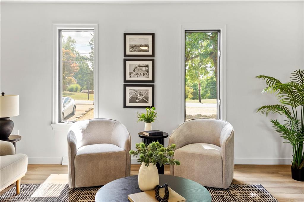 1546 West Ingomar Road Pittsburgh, PA 15237 - Photo 8 of 49 a living room with furniture and a potted plant