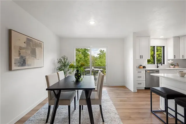 a vase of flowers sitting on a table