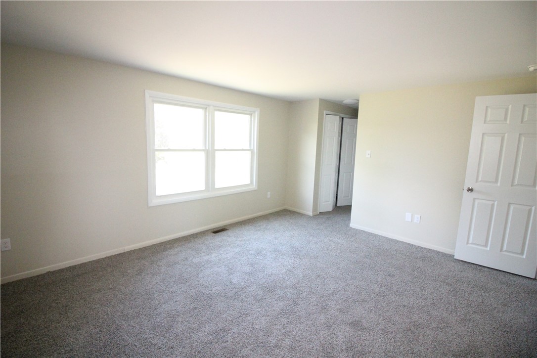 6655 North Centenary Road Williamson, NY 14589 - Photo 15 of 23 Main bedroom, new carpet, freshly painted, with pr