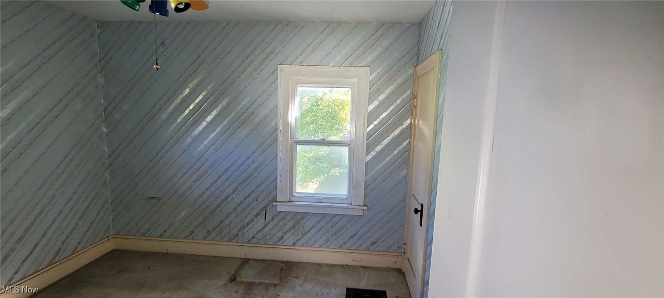 927 Yellowstone Road Cleveland Heights, OH 44121 - Photo 10 of 13 Empty room featuring concrete flooring