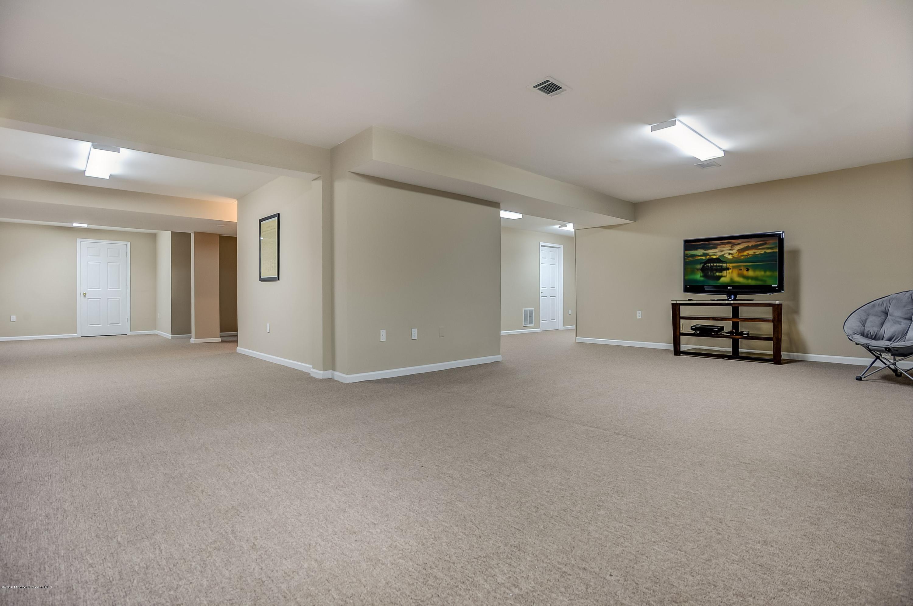 323 Wedgewood Road Morganville, NJ 07751 - Photo 24 of 27 a view of a livingroom with furniture