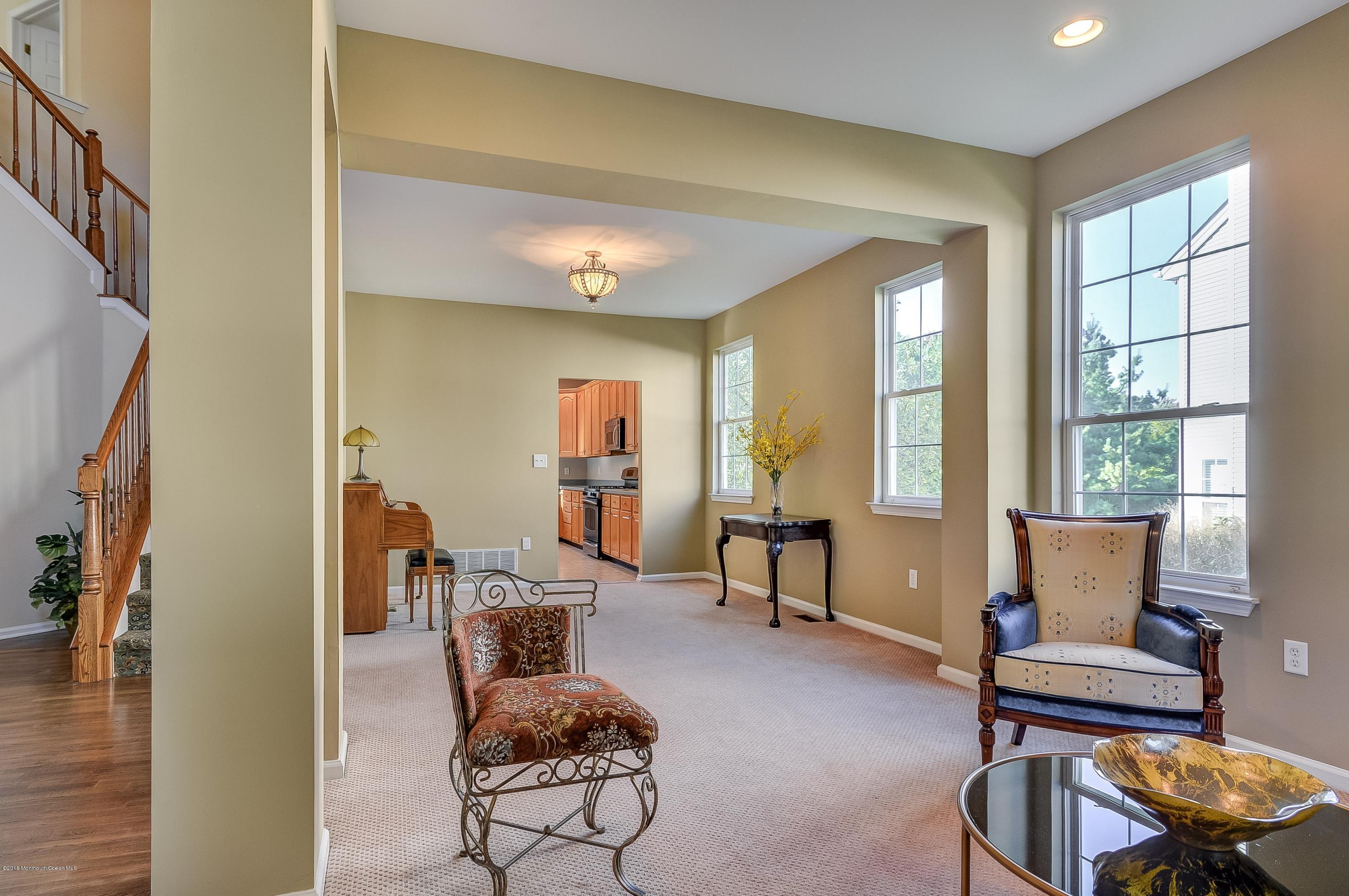 323 Wedgewood Road Morganville, NJ 07751 - Photo 4 of 27 a living room with furniture and a window