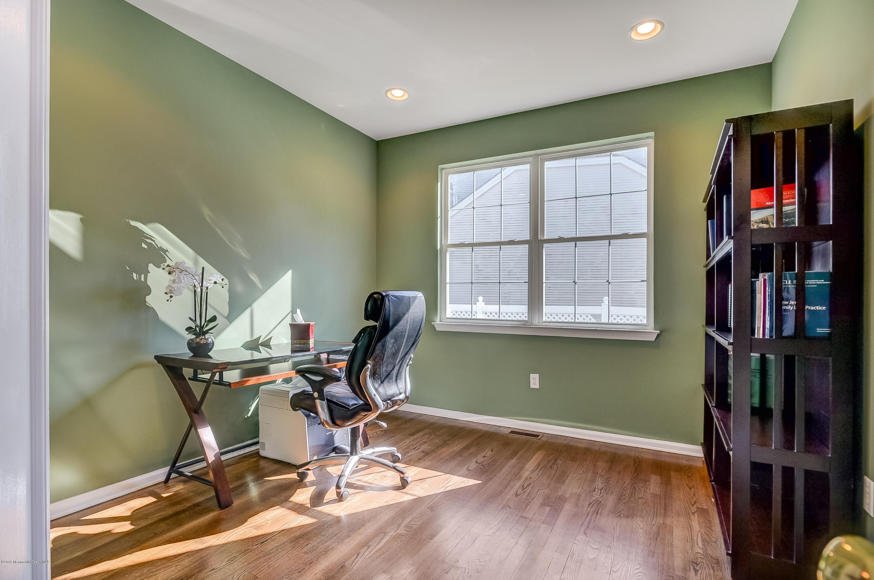 323 Wedgewood Road Morganville, NJ 07751 - Photo 9 of 27 a workspace with furniture hardwood and a window