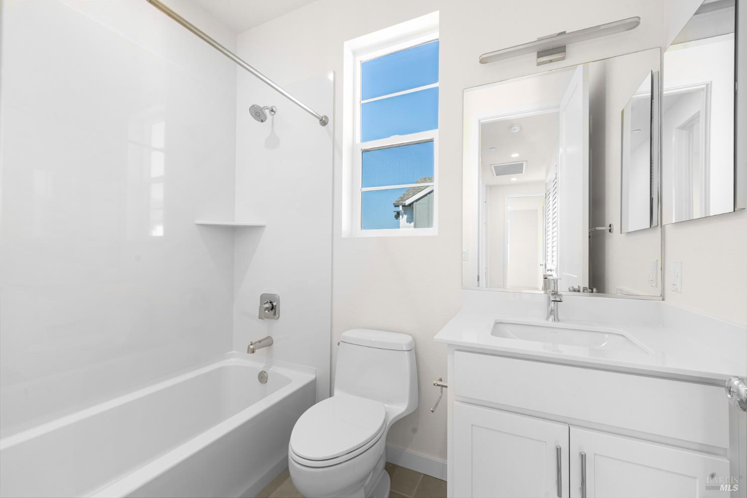 1448 Waterside Lane Rohnert Park, CA 94928 - Photo 31 of 35 a bathroom with a bathtub shower sink vanity and toilet