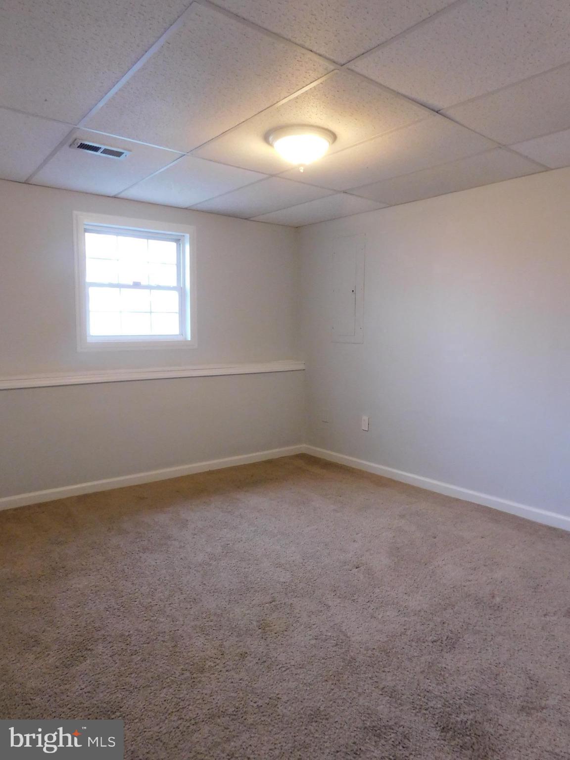 6572 12th Street Chesapeake Beach, MD 20732 - Photo 8 of 15 Basement bedroom 4