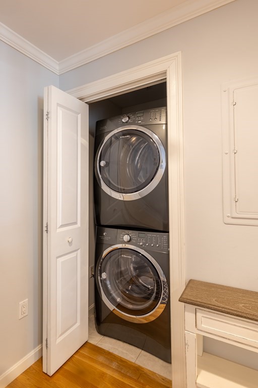 75 Main Street, Unit 102 Amesbury, MA 01913 - Photo 14 of 28 a utility room with dryer and washer