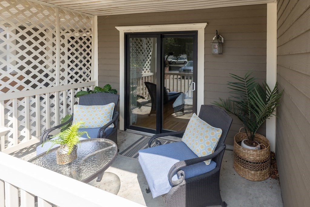 75 Main Street, Unit 102 Amesbury, MA 01913 - Photo 24 of 28 a living room with furniture and a potted plant