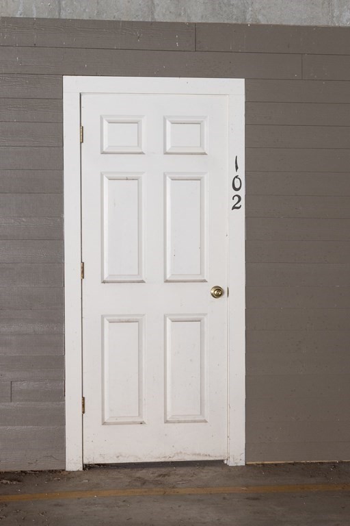 75 Main Street, Unit 102 Amesbury, MA 01913 - Photo 28 of 28 a view of wooden door