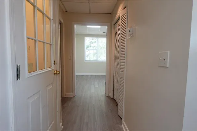 a view of staircase with wooden floor