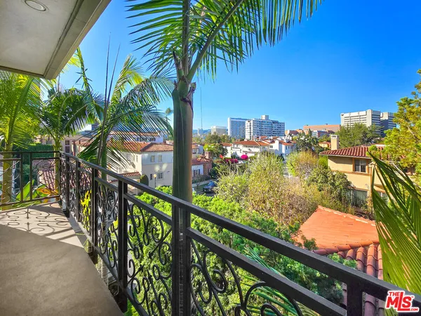 a view of a city from a balcony