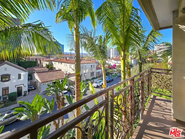 a view of street from a balcony