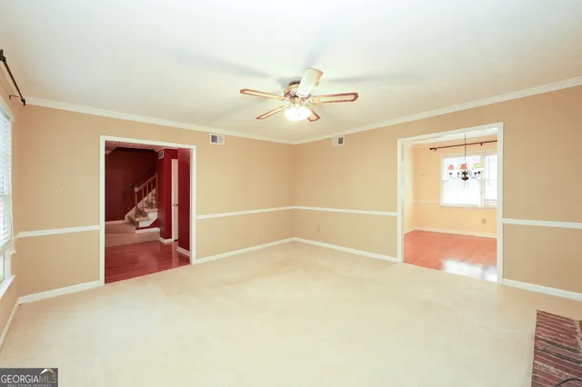 a kitchen with metallic refrigerator freezer and a dishwasher