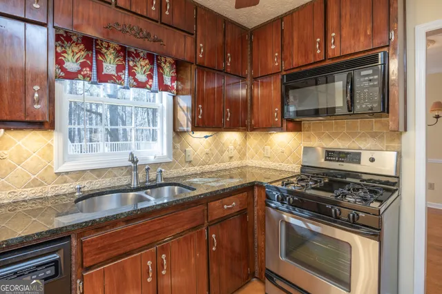 a view of a room with a wooden floor