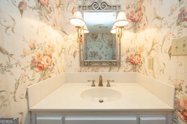 a bathroom with a bathtub and a sink
