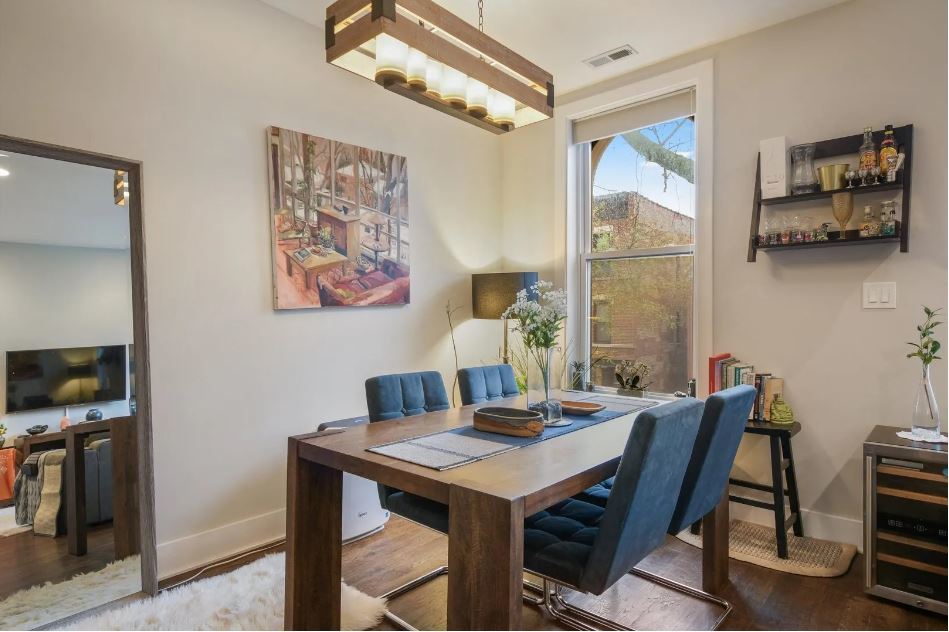 2153 West Potomac Avenue, Unit 2F Chicago, IL 60622 - Photo 6 of 15 a view of a dining room with furniture window and outside view