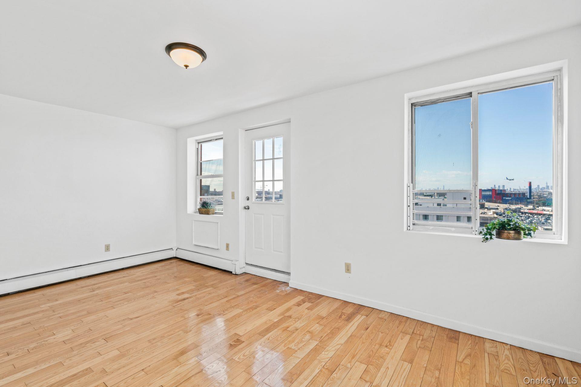 136-16 31st Road, Unit 8B Queens, NY 11354 - Photo 7 of 23 Entrance foyer featuring light hardwood / wood-style flooring