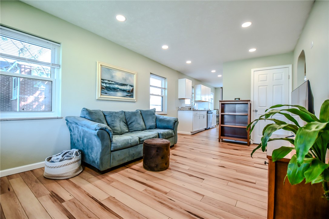 816 South Smithville Road Dayton, OH 45403 - Photo 7 of 33 This bright and airy open-concept living area offers beautiful hardwood flooring and recessed lighting.