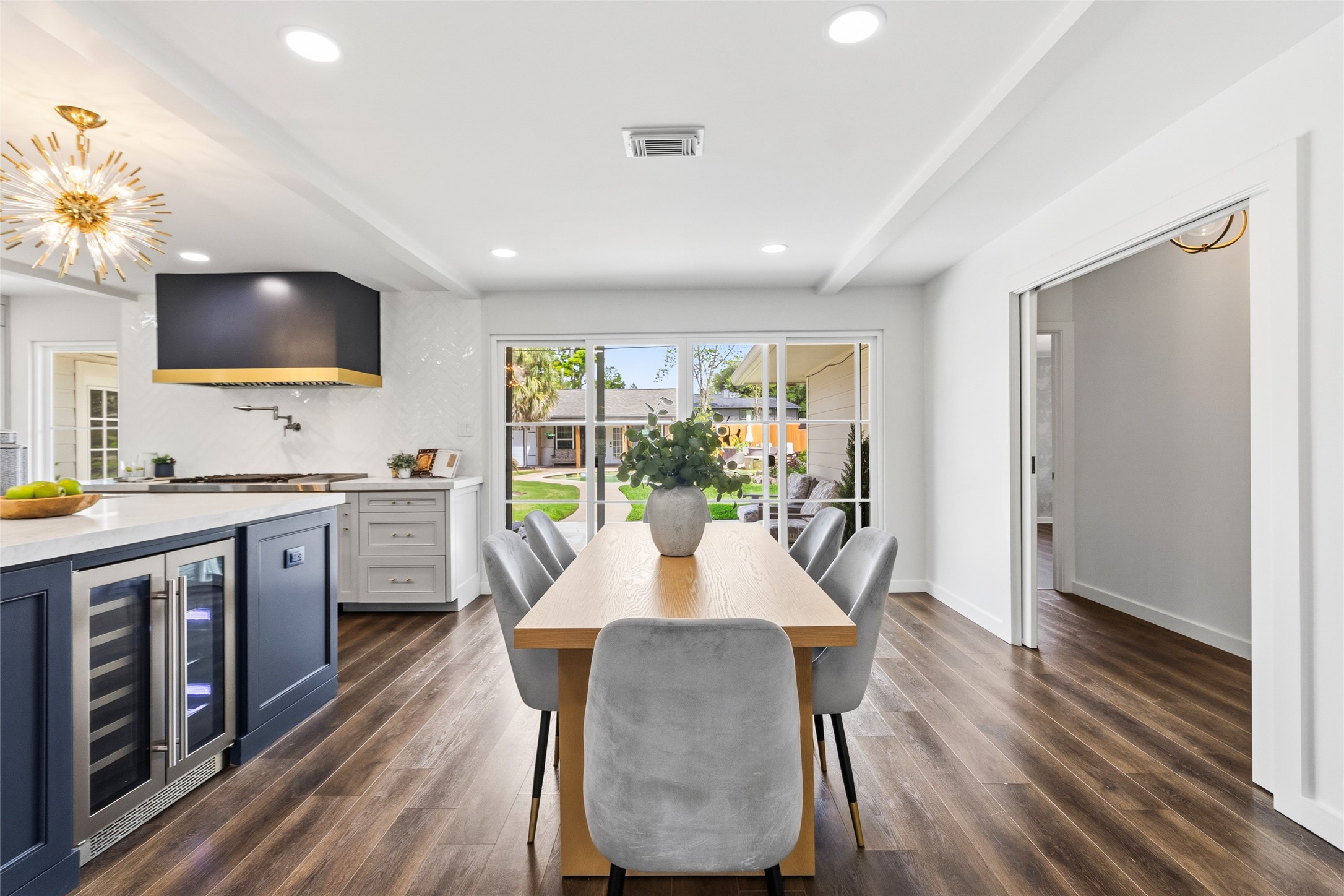 1914 Peppermill Road Houston, TX 77080 - Photo 10 of 49 Your dining area becomes a daily highlight, with natural light pouring in and backyard views that make every meal feel just a little more relaxed.