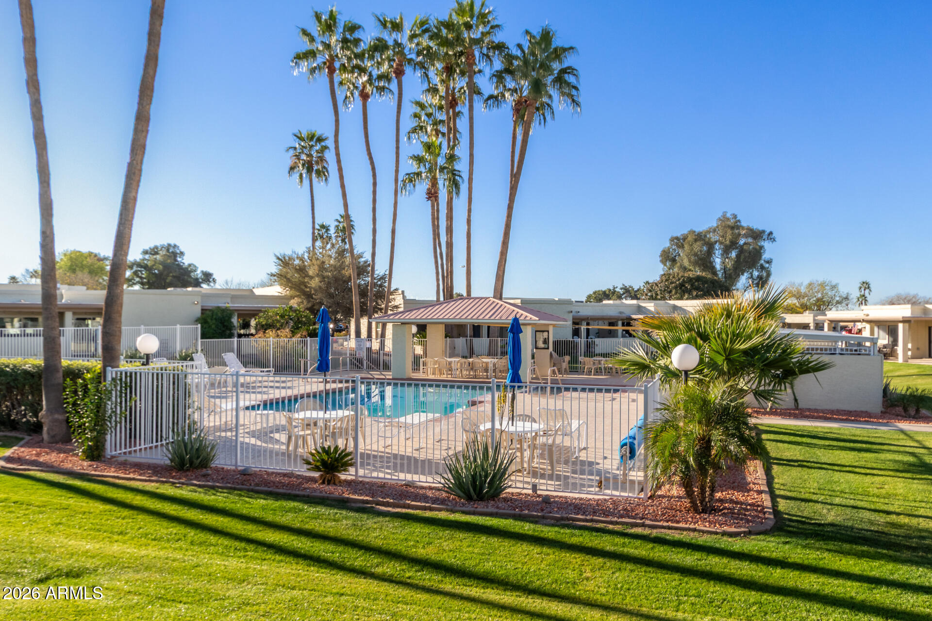 632 South 79th Way Mesa, AZ 85208 - Photo 2 of 30 a view of a house with a yard and sitting area