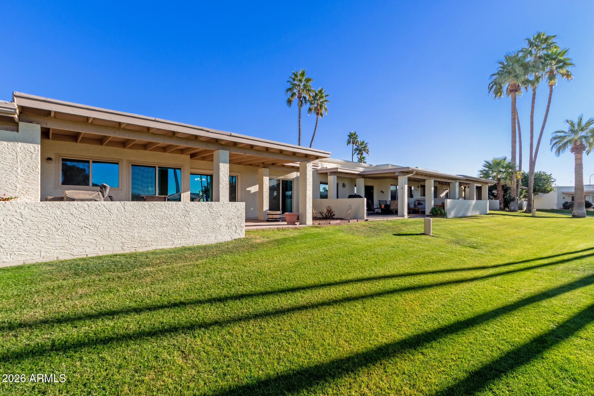 632 South 79th Way Mesa, AZ 85208 - Photo 23 of 30 a front view of a house with a garden